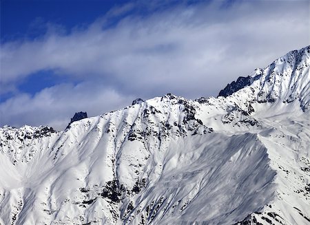 simsearch:400-07219033,k - Winter snow mountains at nice sunny day. View from ski lift on Hatsvali, Svaneti region of Georgia. Caucasus Mountains. Stock Photo - Budget Royalty-Free & Subscription, Code: 400-08893564