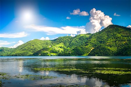 simsearch:400-05927708,k - Beautiful green hills landscape with reflection on water at Phewa lake, Pokhara. Relax after trekking in Himalaya mountains, Nepal. Nature landscape. Travel background. Holidays and recreation Stockbilder - Microstock & Abonnement, Bildnummer: 400-08893580