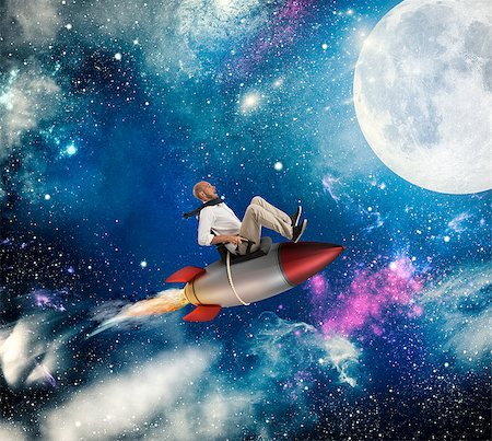 simsearch:400-09220882,k - Businessman flying over a rocket in the universe. Increase the climb to success concept Photographie de stock - Aubaine LD & Abonnement, Code: 400-08900142