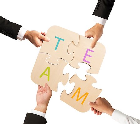 simsearch:400-08669915,k - Businessmen working together to build a colored puzzle. Concept of team that works together Stock Photo - Budget Royalty-Free & Subscription, Code: 400-08900294