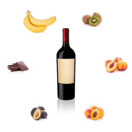 Red wine with empty label with different fruits and chocolate isolated on white background. Aroma of wine. Wine bouguet. Stock Photo - Budget Royalty-Free & Subscription, Code: 400-08916746