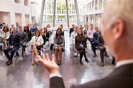 Audience Applauding Speaker After Conference Presentation Stock Photo - Budget Royalty-Free & Subscription, Code: 400-08937648