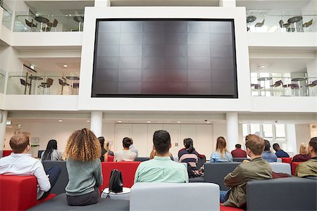 simsearch:400-08937692,k - Students watching big screen in university atrium, back view Stock Photo - Budget Royalty-Free & Subscription, Code: 400-08937697