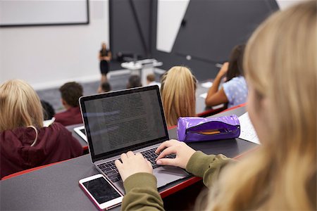 simsearch:400-08937692,k - Female student using laptop at a university lecture Stock Photo - Budget Royalty-Free & Subscription, Code: 400-08937783