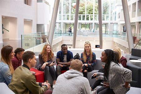 simsearch:400-08937692,k - Students sitting in the foyer of modern university building Stock Photo - Budget Royalty-Free & Subscription, Code: 400-08937829