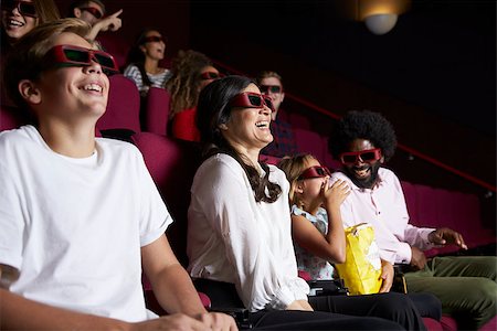 photo of theatre audience laughing - Audience In Cinema Wearing 3D Glasses Watching Comedy Film Stock Photo - Budget Royalty-Free & Subscription, Code: 400-08937958