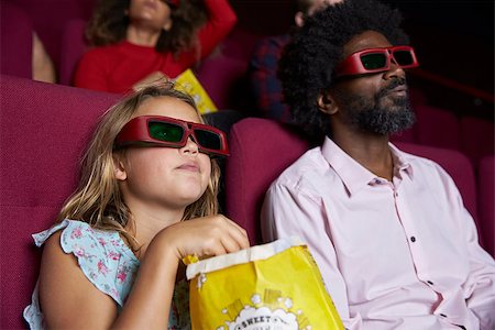 Audience In Cinema Wearing 3D Glasses Watching Comedy Film Stock Photo - Budget Royalty-Free & Subscription, Code: 400-08937953