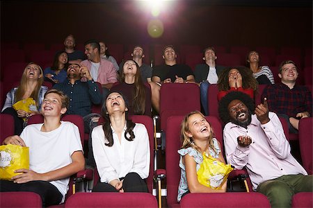 Audience In Cinema Watching Comedy Film Stock Photo - Budget Royalty-Free & Subscription, Code: 400-08937962