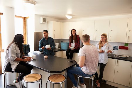 Students Relaxing In Kitchen Of Shared Accommodation Stock Photo - Budget Royalty-Free & Subscription, Code: 400-08938118