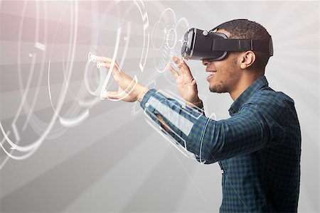 simsearch:400-08621230,k - Man Using Virtual Reality Headset Foto de stock - Super Valor sin royalties y Suscripción, Código: 400-08938150