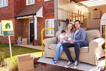family with sold sign - Family With Sofa On Tail Lift Of Removal Truck Moving Home Stock Photo - Budget Royalty-Free & Subscription, Code: 400-08938277