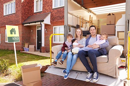 family with sold sign - Family With Sofa On Tail Lift Of Removal Truck Moving Home Stock Photo - Budget Royalty-Free & Subscription, Code: 400-08938279