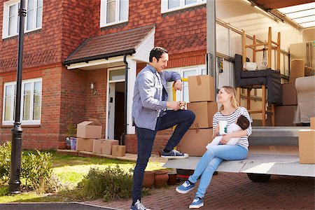 family with sold sign - Family On Tail Lift Of Removal Truck Moving Home Stock Photo - Budget Royalty-Free & Subscription, Code: 400-08938297