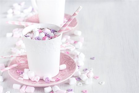 simsearch:400-08338397,k - Mug of hot chocolate with marshmallow and heart shaped candies. Copy space background. Photographie de stock - Aubaine LD & Abonnement, Code: 400-08955444