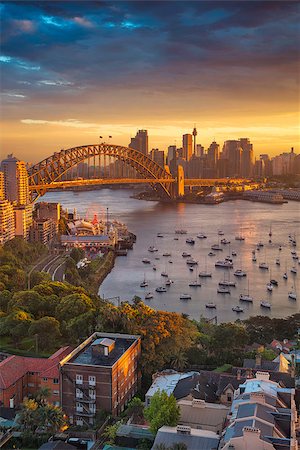 rudi1976 (artist) - Cityscape image of Sydney, Australia with Harbour Bridge and Sydney skyline during sunset. Foto de stock - Super Valor sin royalties y Suscripción, Código: 400-08955593