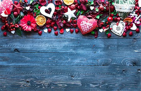 simsearch:400-08034173,k - Valentine's Day Background with love themed elements like cotton and paper hearts, flowers, berries, oranges and other decorations. Wooden old parquet on the back. Stockbilder - Microstock & Abonnement, Bildnummer: 400-08958147