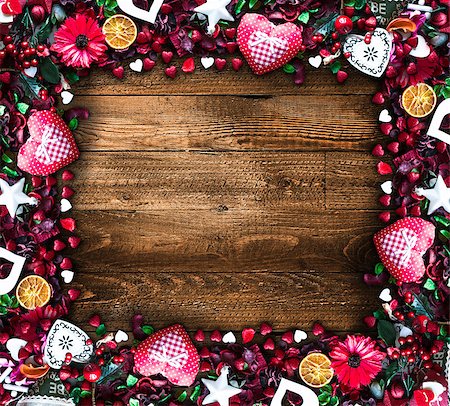 simsearch:400-08034173,k - Valentine's Day Background with love themed elements like cotton and paper hearts, flowers, berries, oranges and other decorations. Wooden old parquet on the back. Stockbilder - Microstock & Abonnement, Bildnummer: 400-08958148