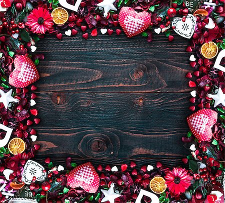 simsearch:400-08034173,k - Valentine's Day Background with love themed elements like cotton and paper hearts, flowers, berries, oranges and other decorations. Wooden old parquet on the back. Stockbilder - Microstock & Abonnement, Bildnummer: 400-08958154