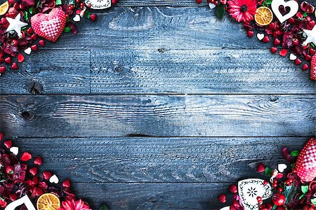 simsearch:400-08034173,k - Valentine's Day Background with love themed elements like cotton and paper hearts, flowers, berries, oranges and other decorations. Wooden old parquet on the back. Stockbilder - Microstock & Abonnement, Bildnummer: 400-08958155