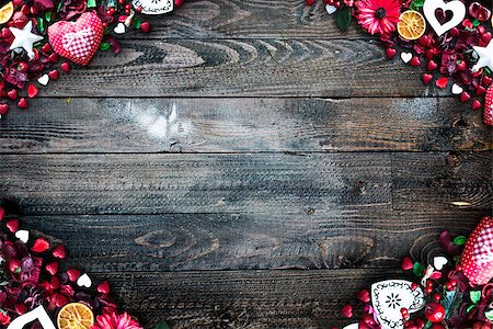 simsearch:400-08034173,k - Valentine's Day Background with love themed elements like cotton and paper hearts, flowers, berries, oranges and other decorations. Wooden old parquet on the back. Stockbilder - Microstock & Abonnement, Bildnummer: 400-08958156