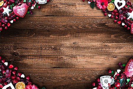 simsearch:400-08034173,k - Valentine's Day Background with love themed elements like cotton and paper hearts, flowers, berries, oranges and other decorations. Wooden old parquet on the back. Stockbilder - Microstock & Abonnement, Bildnummer: 400-08958157
