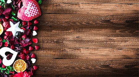 simsearch:400-08034173,k - Valentine's Day Background with love themed elements like cotton and paper hearts, flowers, berries, oranges and other decorations. Wooden old parquet on the back. Stockbilder - Microstock & Abonnement, Bildnummer: 400-08958176