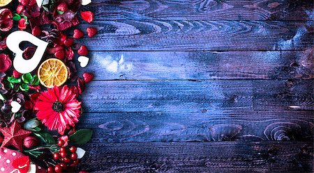 simsearch:400-08034173,k - Valentine's Day Background with love themed elements like cotton and paper hearts, flowers, berries, oranges and other decorations. Wooden old parquet on the back. Stockbilder - Microstock & Abonnement, Bildnummer: 400-08958180