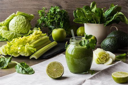 Detox diet. Green smoothie with different vegetables on wooden background. Stock Photo - Budget Royalty-Free & Subscription, Code: 400-08959126