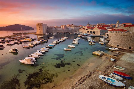 famous dock photograph sunrise - Beautiful romantic old town of Dubrovnik during sunrise. Stock Photo - Budget Royalty-Free & Subscription, Code: 400-08959510