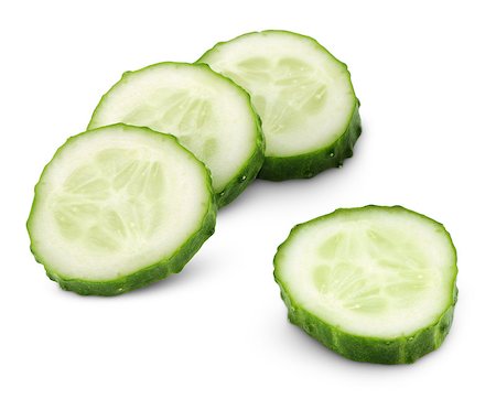 Chopped cucumber vegetable isolated on white background with clipping path Photographie de stock - Aubaine LD & Abonnement, Code: 400-08967678