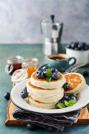 photos of blueberries for kitchen - Cottage cheese pancakes with fresh blueberries and coffee, Delicious Breakfast Stock Photo - Budget Royalty-Free & Subscription, Code: 400-08963317