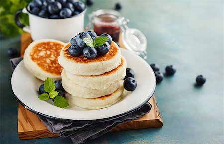 photos of blueberries for kitchen - Cottage cheese pancakes with blueberries and mint, Healthy Breakfast. Stock Photo - Budget Royalty-Free & Subscription, Code: 400-08963831