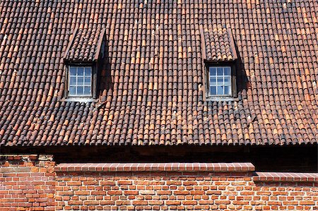 Old tiled roof with dormers in Gdansk, Poland. Stock Photo - Budget Royalty-Free & Subscription, Code: 400-08978732