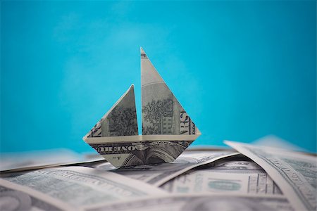 simsearch:400-08997019,k - ship origami banknotes on a background of money Stock Photo - Budget Royalty-Free & Subscription, Code: 400-08997019