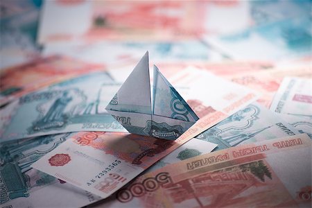 simsearch:400-08997019,k - ship origami banknotes on a background of money Stock Photo - Budget Royalty-Free & Subscription, Code: 400-08997029