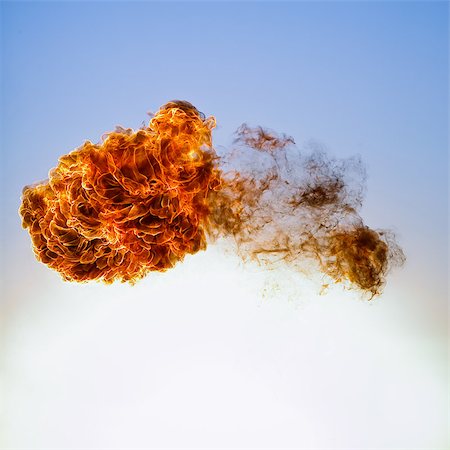simsearch:846-03163664,k - Fireball explosion. Isolated on blue sky background Stock Photo - Budget Royalty-Free & Subscription, Code: 400-08997118