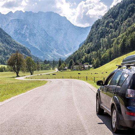 family and luggage summer - car for traveling with a mountain road Stock Photo - Budget Royalty-Free & Subscription, Code: 400-09008509