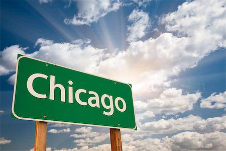 street sign and chicago - Chicago Green Road Sign Over Dramatic Clouds and Sky. Stock Photo - Budget Royalty-Free & Subscription, Code: 400-09009217
