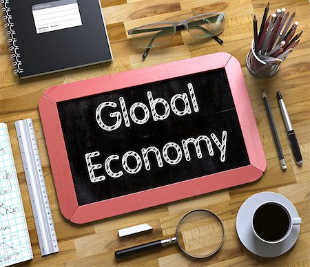 Global Economy on Small Chalkboard. Red Small Chalkboard with Handwritten Business Concept - Global Economy - on Office Desk and Other Office Supplies Around. Top View. 3d Rendering. Stock Photo - Budget Royalty-Free & Subscription, Code: 400-09009717