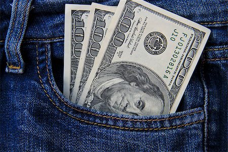 American dollar banknotes in jeans pocket Stockbilder - Microstock & Abonnement, Bildnummer: 400-09009948