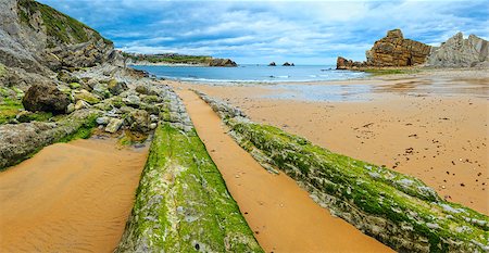 simsearch:400-09136239,k - Arnia Beach (Spain). Spring Atlantic Ocean coastline with rock formations. Two shots stitch image. Photographie de stock - Aubaine LD & Abonnement, Code: 400-09009964