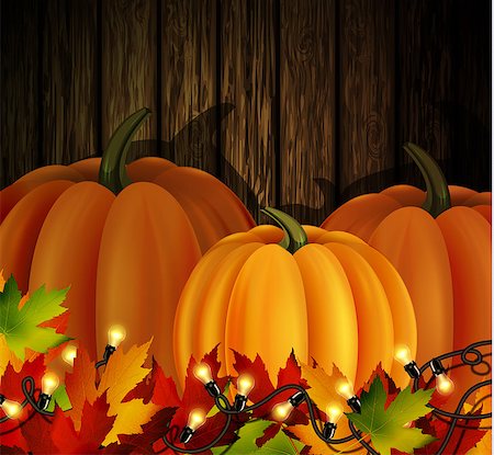 autumn leaves cozy patio lights and three orange pumpkins on wooden texture Stock Photo - Budget Royalty-Free & Subscription, Code: 400-09001612