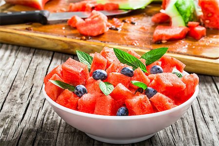 watermelon with blueberries and fresh mint , selective focus Stock Photo - Budget Royalty-Free & Subscription, Code: 400-09019239