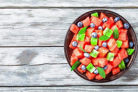 Watermelon and Blueberry salad on an earthenware dish top view Stock Photo - Budget Royalty-Free & Subscription, Code: 400-09019241