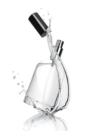 Full jar of perfume with reflection with water splash on white background Stock Photo - Budget Royalty-Free & Subscription, Code: 400-09019323