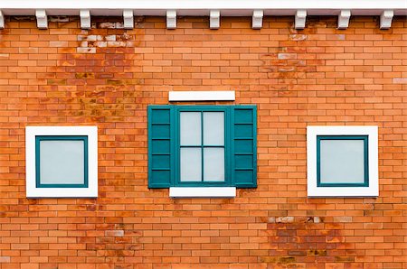 Green window on the orange brick wall outside the house in the Italy retro style Stock Photo - Budget Royalty-Free & Subscription, Code: 400-09019433