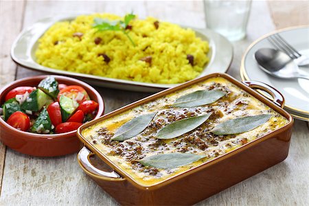 bobotie is a curry flavored meatloaf with baked egg on top. Stock Photo - Budget Royalty-Free & Subscription, Code: 400-09019609