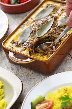 bobotie, south african cuisine isolated on white background Stock Photo - Budget Royalty-Free & Subscription, Code: 400-09019612