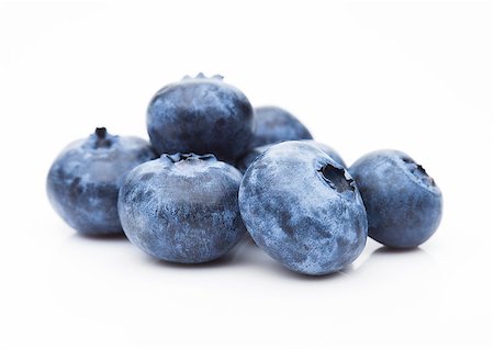 denismart (artist) - Fresh healthy organic blueberry on white background Foto de stock - Royalty-Free Super Valor e Assinatura, Número: 400-09019691