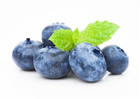 denismart (artist) - Fresh healthy organic blueberry with mint leaf on white background Foto de stock - Royalty-Free Super Valor e Assinatura, Número: 400-09019692